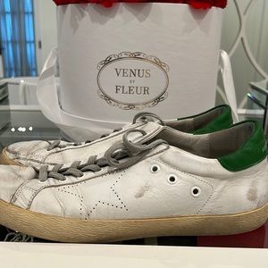 gently used mens white and green golden goose sneaker